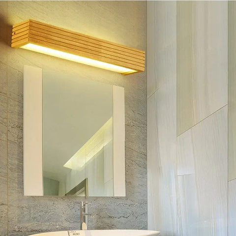 applique murale en bois massif de 30 cm de diamètre dans une salle de bain