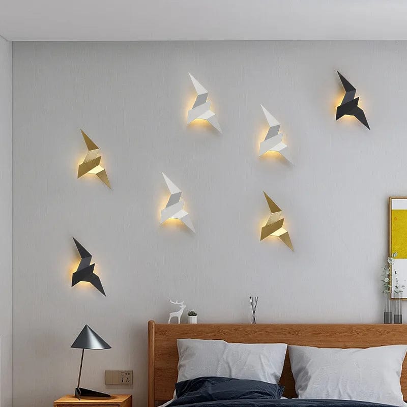 des appliques murales en forme d'oiseaux