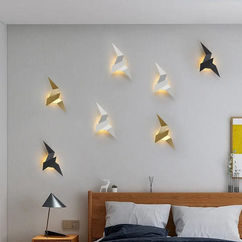 des appliques murales en forme d'oiseaux