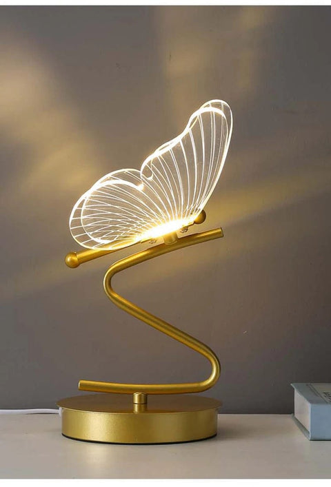 une lampe en forme de papillon